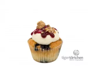 Blueberry-Cheesecake Cupcake Blueberry-Cheesecake Cupcake: Blaubeer-Vanille-Cupcake und Frischkäsecreme-Topping mit Keks