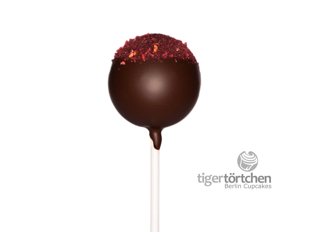 Merlot-Berry Cake-Pop Merlot-Berry Cake-Pop: Schoko-Rotwein-Kuchen mit Zartbitter-Schokoladenhülle und Himbeere