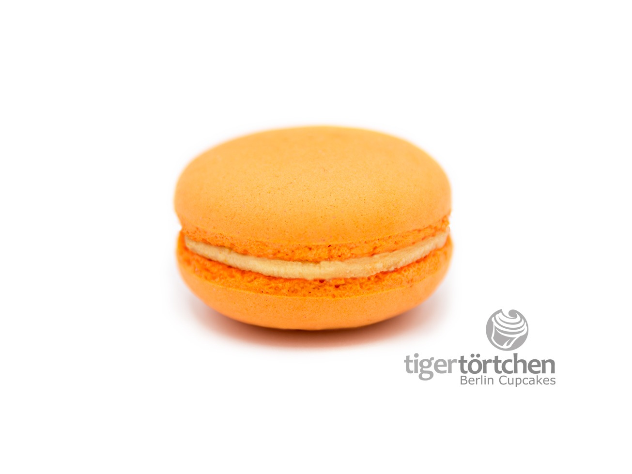 Sweet-Orange Macaron Sweet-Orange Macaron: Macaron mit einer Füllung aus Orange und weißer Schokolade