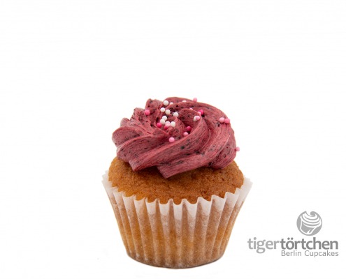 Saure-Heidi Cupcake: Vanille-Cupcake mit Zitronen-Füllung und Heidelbeer-Creme