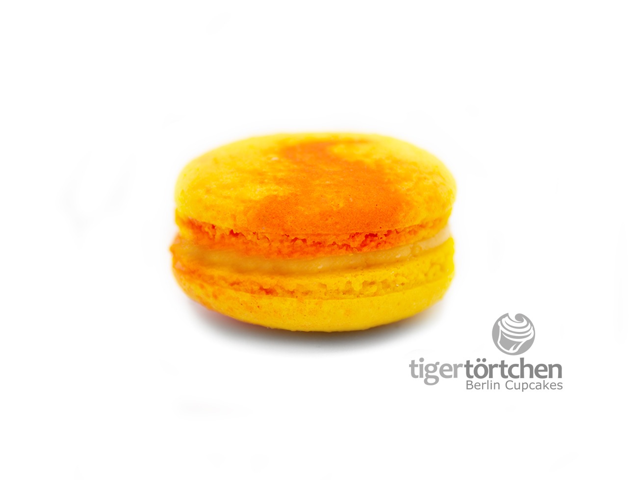 Mango Macaron: Macaron mit einer Füllung aus einem feinen Mango-Püree